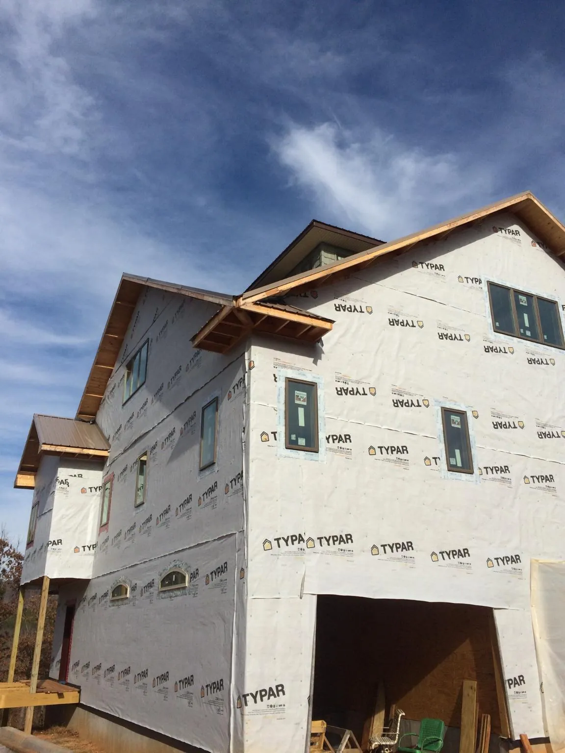 Stick built house wrapped in Typar with new roof framing and dormers in Essex